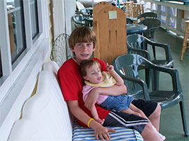 Claire and Big Brother on the Marina Patio